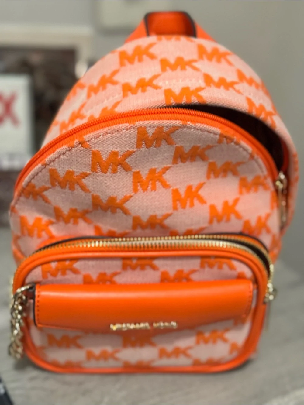 Michael Kors Orange and Cream Monogram Mini Backpack